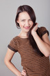 Happy young woman posing