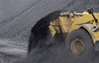 Foto: Excavator in coals. Excavator in coals.