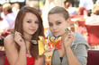 Photo: female teenager eating ice cream female teenager eating ice cream