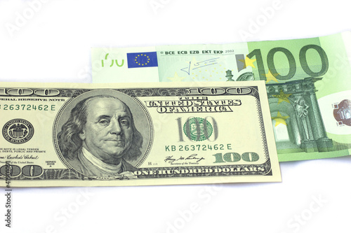 Photo: dollars and euro dollars and euro