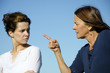 Photo: Mother and daughter, two generations, having an argument Mother and daughter, two generations, having an argument