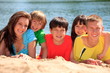 Happy children on beach sand
