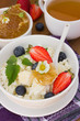 Dietary breakfast -cottage cheese, honey and fresh berry