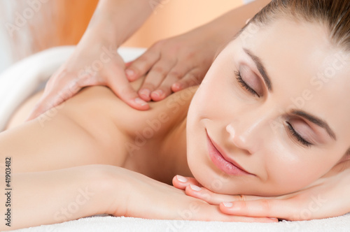 Photo: Smiling woman massage Smiling woman massage