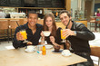 clinking glasses - friends in a coffee bar