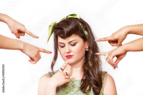 Photo: Woman accused with pointing fingers Woman accused with pointing fingers