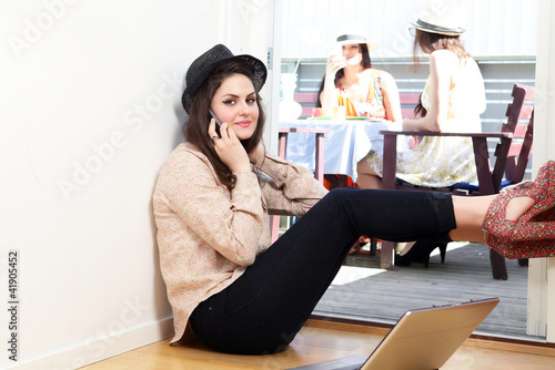 Photo: Teen lifestyle girls relaxing at leisure, front focus Teen lifestyle girls relaxing at leisure, front focus
