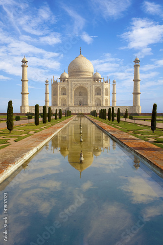 Photo: Taj Mahal at sunrise, reflecting in the pond, India Taj Mahal at sunrise, reflecting in the pond, India