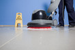 cleaning floor with machine