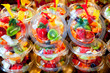 Colorful fruit salad in transparent glasses