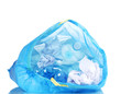 open blue garbage bag with trash isolated on white