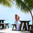 woman in a tropical cafe