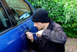 Photo: Man stealing a car Man stealing a car