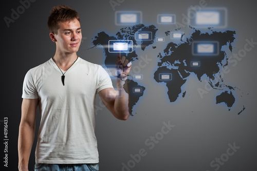 Illustration: Young man pressing messaging type Young man pressing messaging type