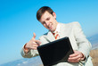 smiling businessman with laptop smiling businessman with laptop