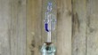fermentational tube on wood background