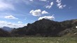 running clouds over peak