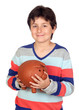 Adorable boy with a big piggy-bank
