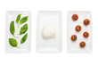 Italian food like flag, basil mozzarella tomato on white Italian food like flag, basil mozzarella tomato on white