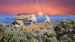 pink sunset behind the sea and rocks, great ocean roan pink sunset behind the sea and rocks, great ocean roan
