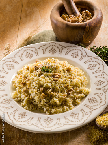 Foto: bulgur with nuts and herbs, vegetarian food bulgur with nuts and herbs, vegetarian food