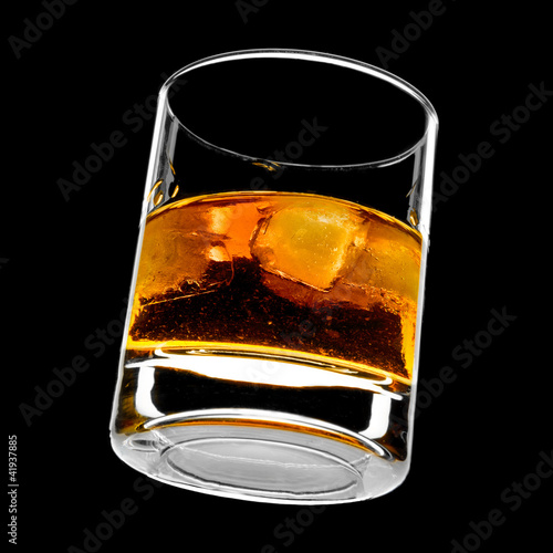 Photo: glass of whiskey on the rocks glass of whiskey on the rocks