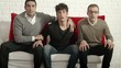 Video: Group of people watching sports match on TV at home Group of people watching sports match on TV at home