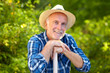 Smiling senior gardener