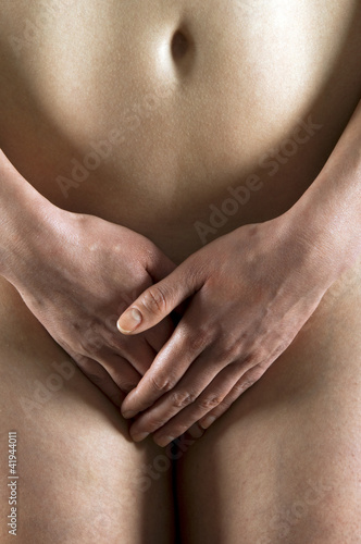 Photo: Abdomen of a young woman Abdomen of a young woman