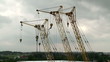 Building cranes on a construction site