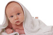 A beautiful baby with white towel