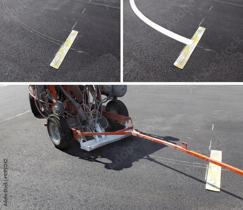 Photo: Roadworks, painting of lines at asphalt Roadworks, painting of lines at asphalt