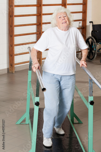 Photo: Tired Senior Woman On Walking Track Tired Senior Woman On Walking Track