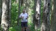 Runner on the forest trail