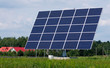 Solar panel station between trees and meadow Solar panel station between trees and meadow