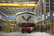Completed luxury ship with tow vehicle