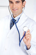Male Doctor Holding Stethoscope Male Doctor Holding Stethoscope