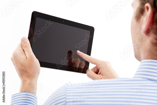 Photo: holding an point on tablet pc businessmen holding an point on tablet pc businessmen