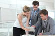 Group of business people meeting around table