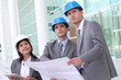 Business people checking construction site