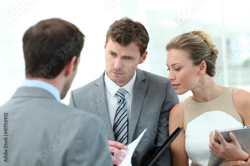 Photo: Business people meeting for contract agreement Business people meeting for contract agreement