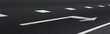White arrow on the asphalt