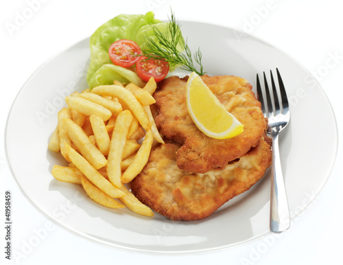 Foto: Schweineschnitzel Wiener Art mit Pommes frites Schweineschnitzel Wiener Art mit Pommes frites