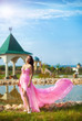 girl in a long pink dress
