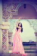 girl in a long pink dress
