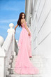 girl in a long pink dress