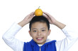 Portrait of Little kid with orange on her head