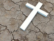 Cross on outdried ground