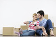 Young couple moving in new home