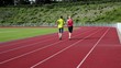 Couple jogging stadium